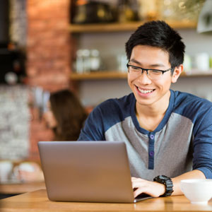 Young Man using a laptop