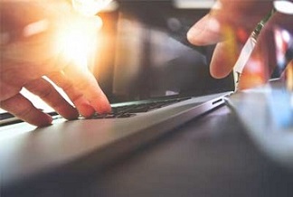 Person Typing on a computer